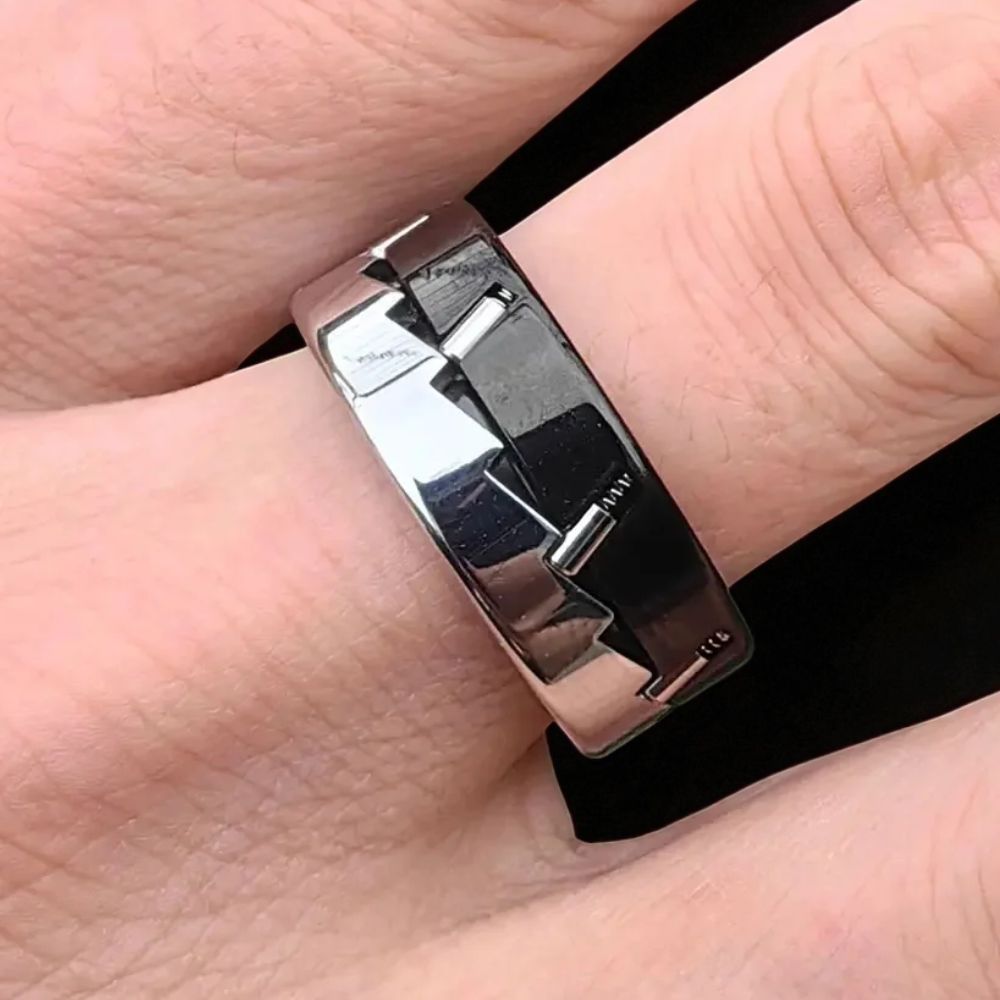 Stainless steel anxiety relief spinner ring with geometric mechanical design