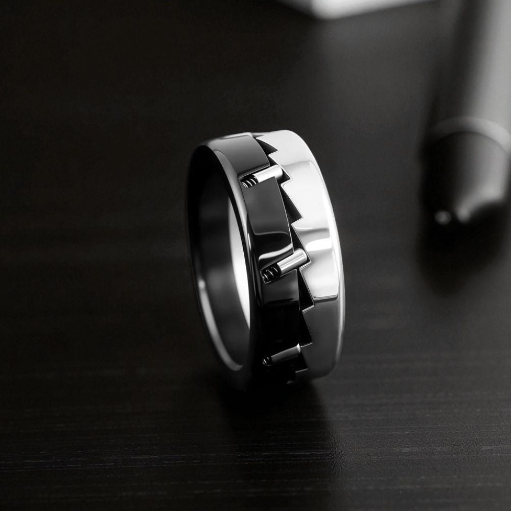 Stainless steel anxiety relief spinner ring with geometric mechanical design